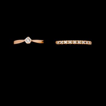 RINGAR, 2 st, 18k guld med briljantslipade diamanter, totalt 0.19 ct. Vikt 4 g.