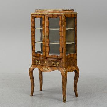 A late 19th century rococo style cabinet.