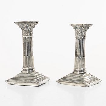 A pair of English silver column candlesticks, mark of Walter Latham & Son, Sheffield, 1910.