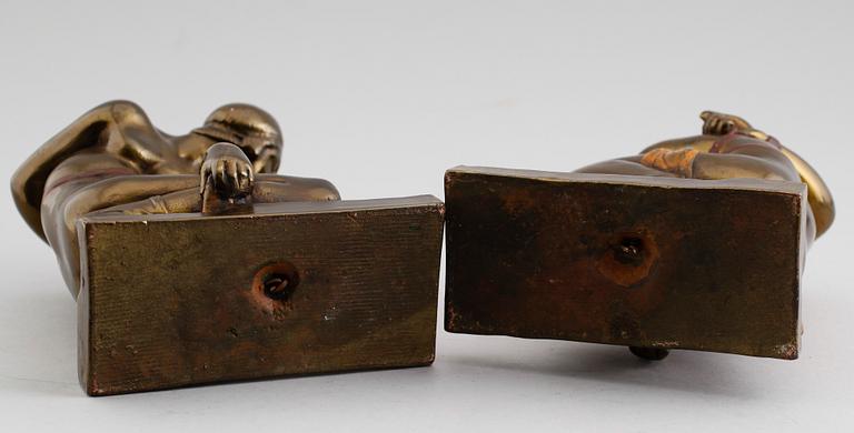 BOKSTÖD, 1 par, patinerad mässing, art déco, otydligt signerade, 1920/30-tal.