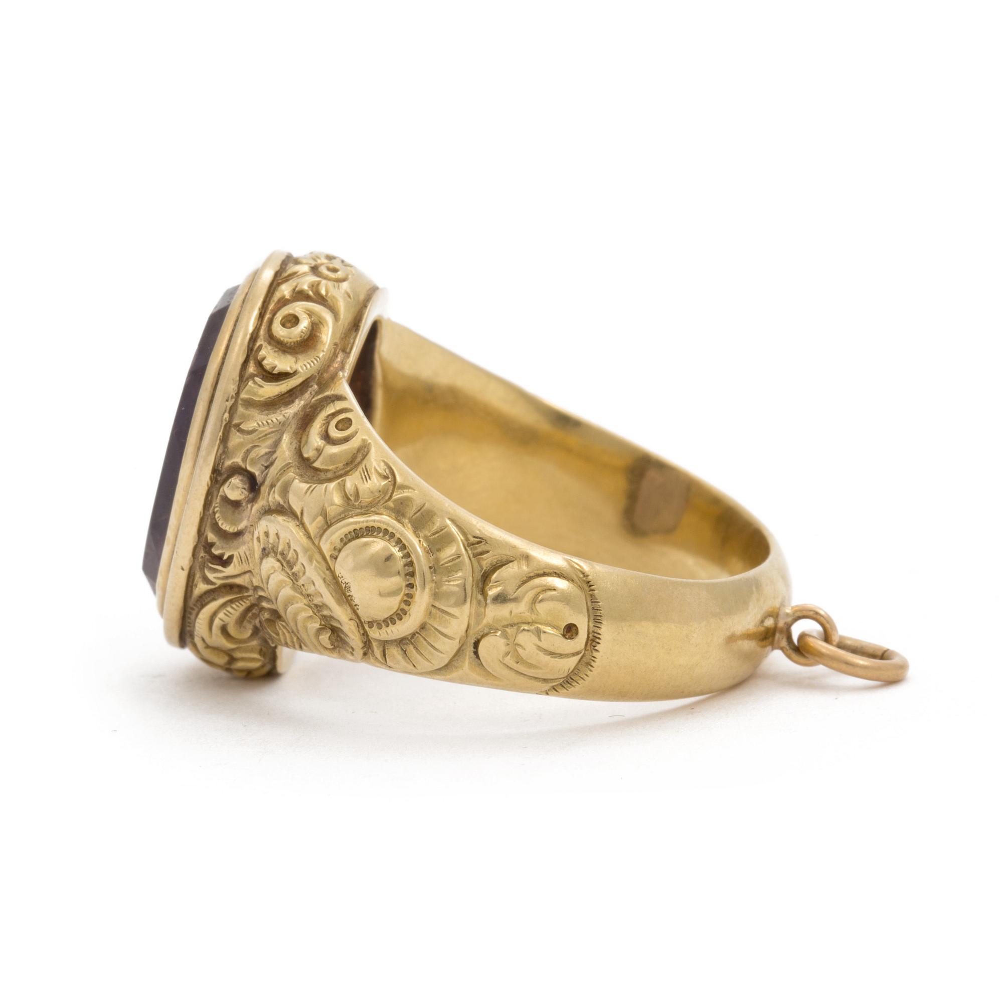 A signet ring set with amethyst.