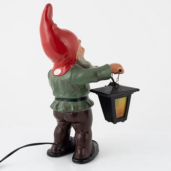A West German earthenware gnome with lantern from the second half of the 20th century.