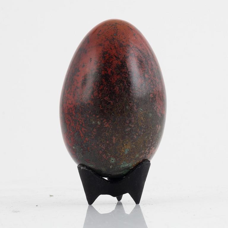 A faience sculpture of an egg by Hans Hedberg Biot, France.