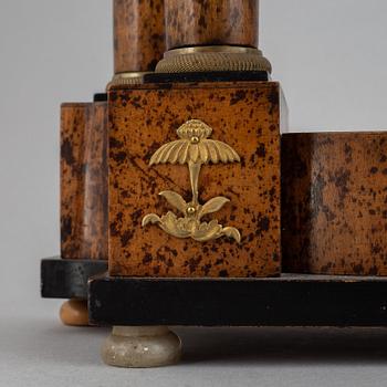 A Biedermeier pendulum clock, probably Germany / Austria. First half of the 19th century.