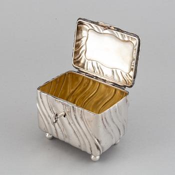 A 20th century parcel-gilt silver sugar-box, Swedish import marks from 1919.