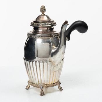 A Swedish silver coffee pot, cream jug and sugar box, Gustavian style, mark of AG Dufva, Stockholm 1911-1912.