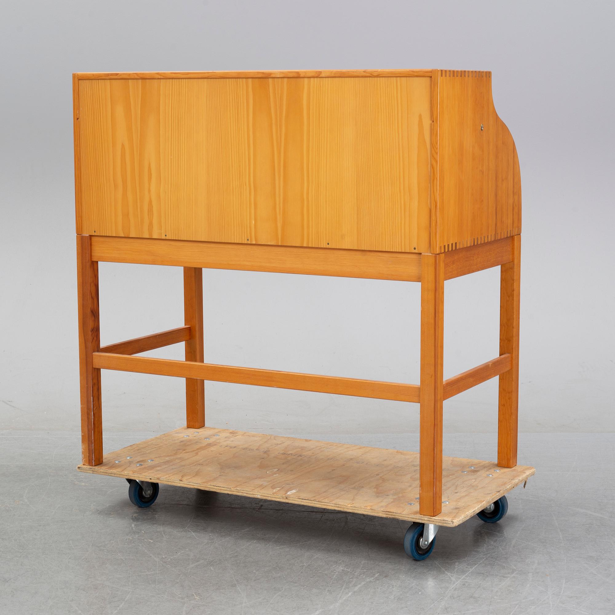 A pine roll top secretary desk by Andreas Hansen, Hadstens, end of the 20th Century.