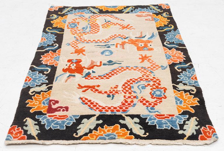 An antique rug, Tibet, circa 1900, approx. 157 x 83 cm.