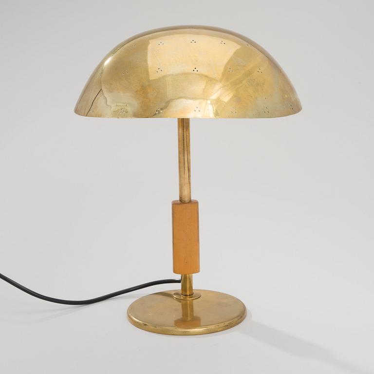 PAAVO TYNELL, A TABLE LAMP. Manufactured by Taito Oy, 1940s.