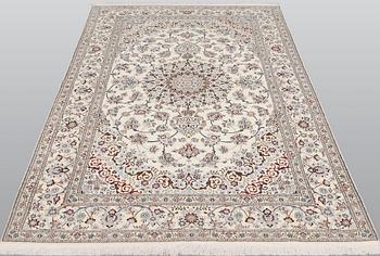 A Nain part silk carpet, 244 x 156 cm.