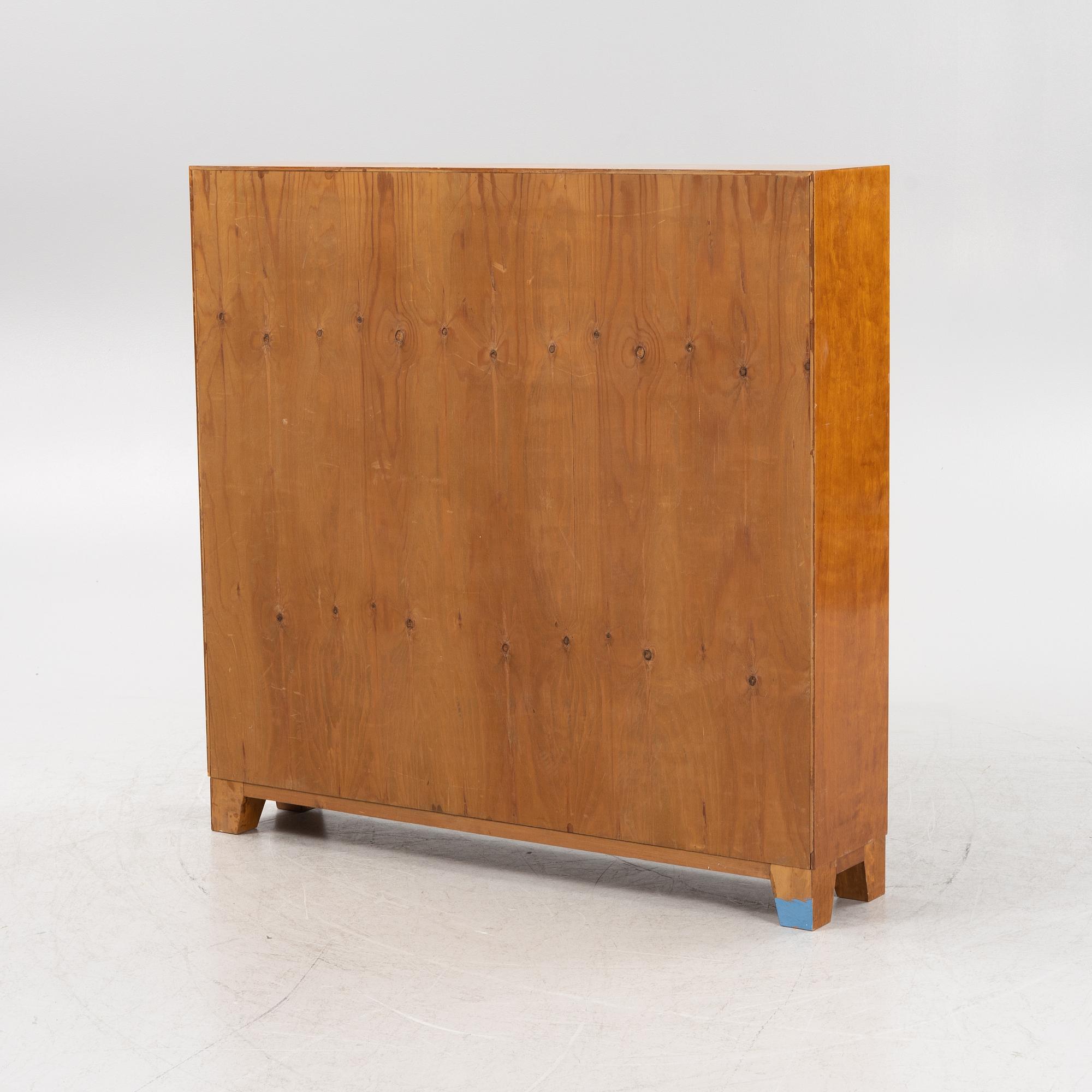 A birch veneered book case, 1930s/40s.