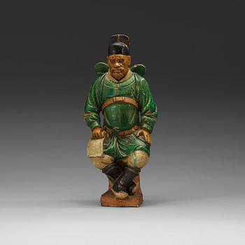 A large sancai glazed figure of a warrior, Ming dynasty (1368-1644).