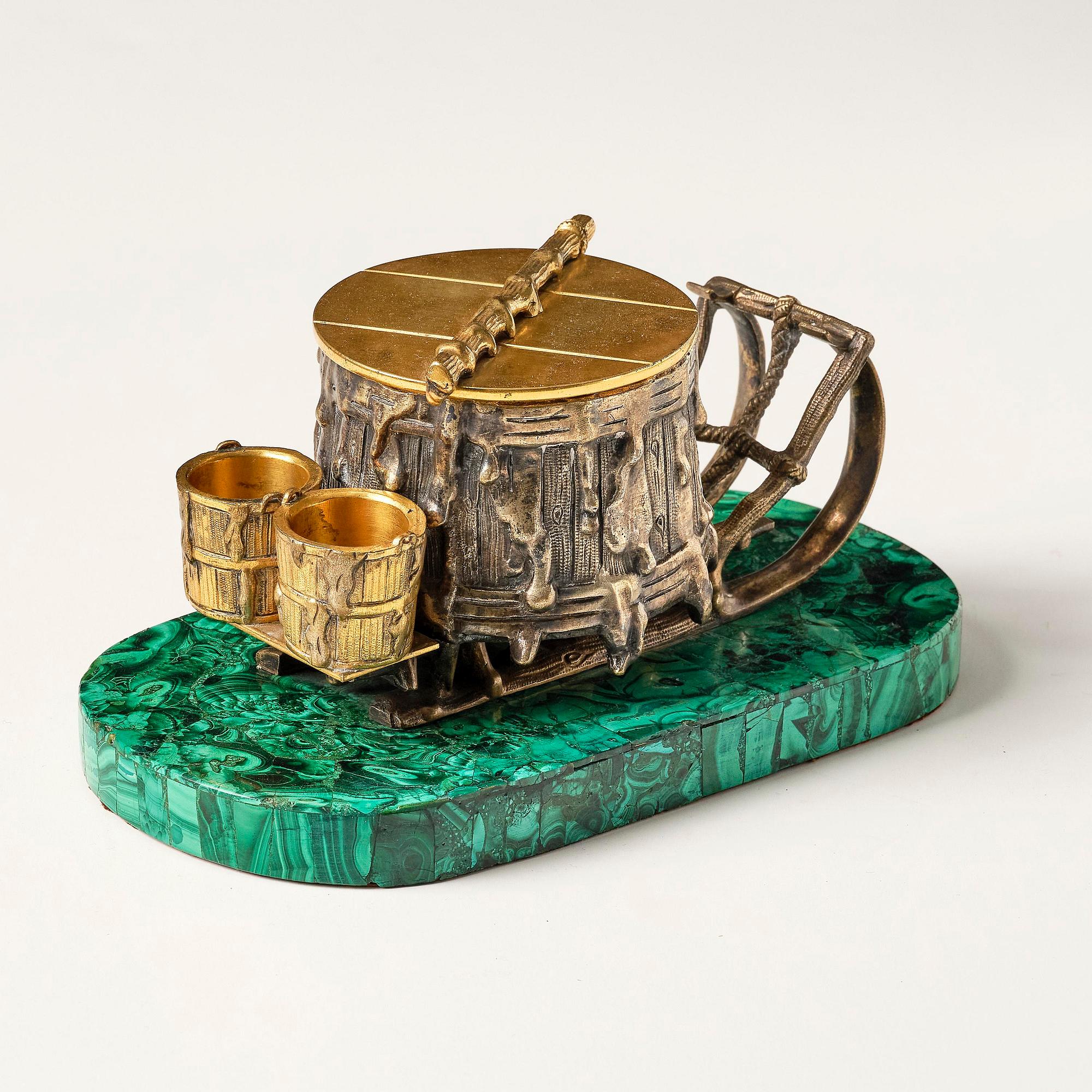 A Russian Alexander II malachite-veneered, silvered and gilt bronze inkwell, later part 19th century.