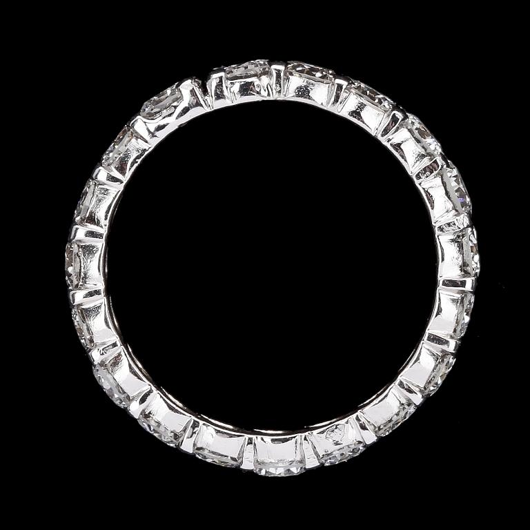 A brilliant cut diamond eternity ring, tot. 3.61 cts.