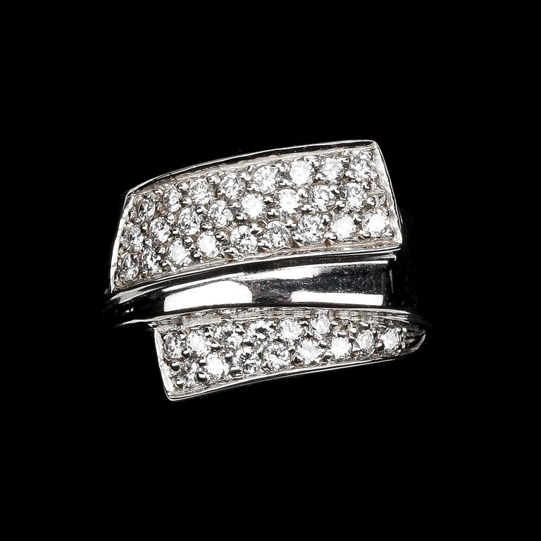 RING, briljantslipade diamanter, tot. 0.75 ct enl gravyr.
