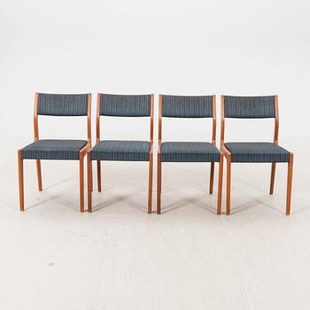 A set of four 1960s teak chairs.