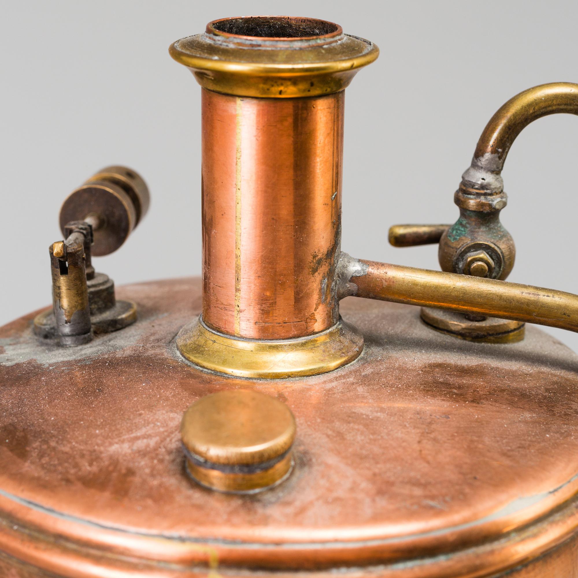 A copper and brass steam engine 20th century.