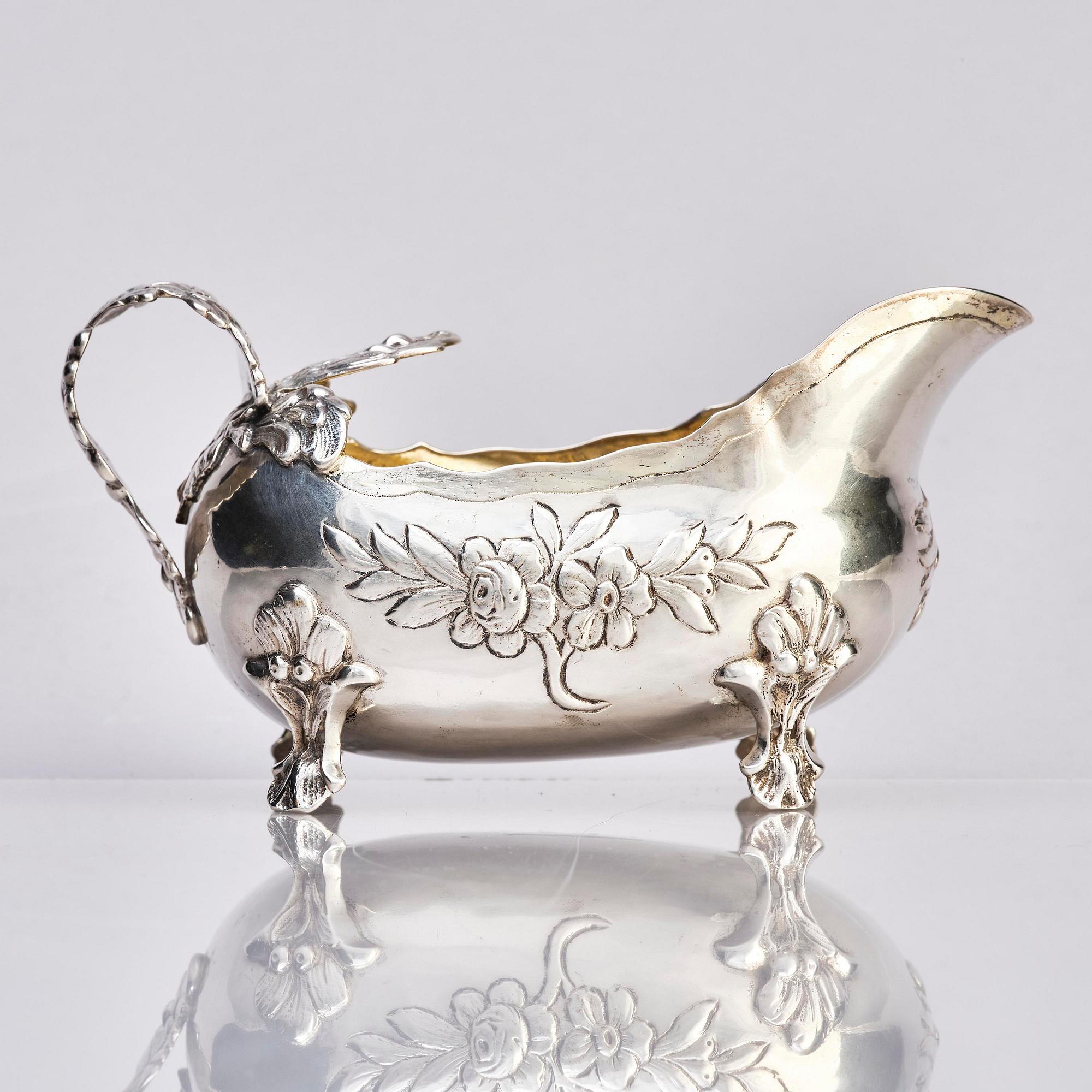 A Swedish mid- 18th century parcel-gilt silver cream-jug, mark of Anders Schotte, Uddevalla 1779.