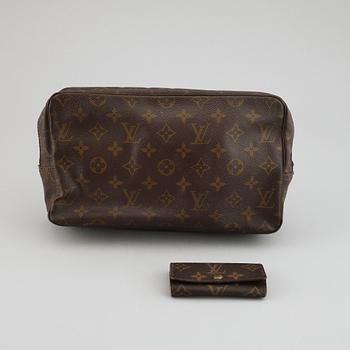 LOUIS VUITTON, a 'Trousse toilette 28' toilet bag and a key case.