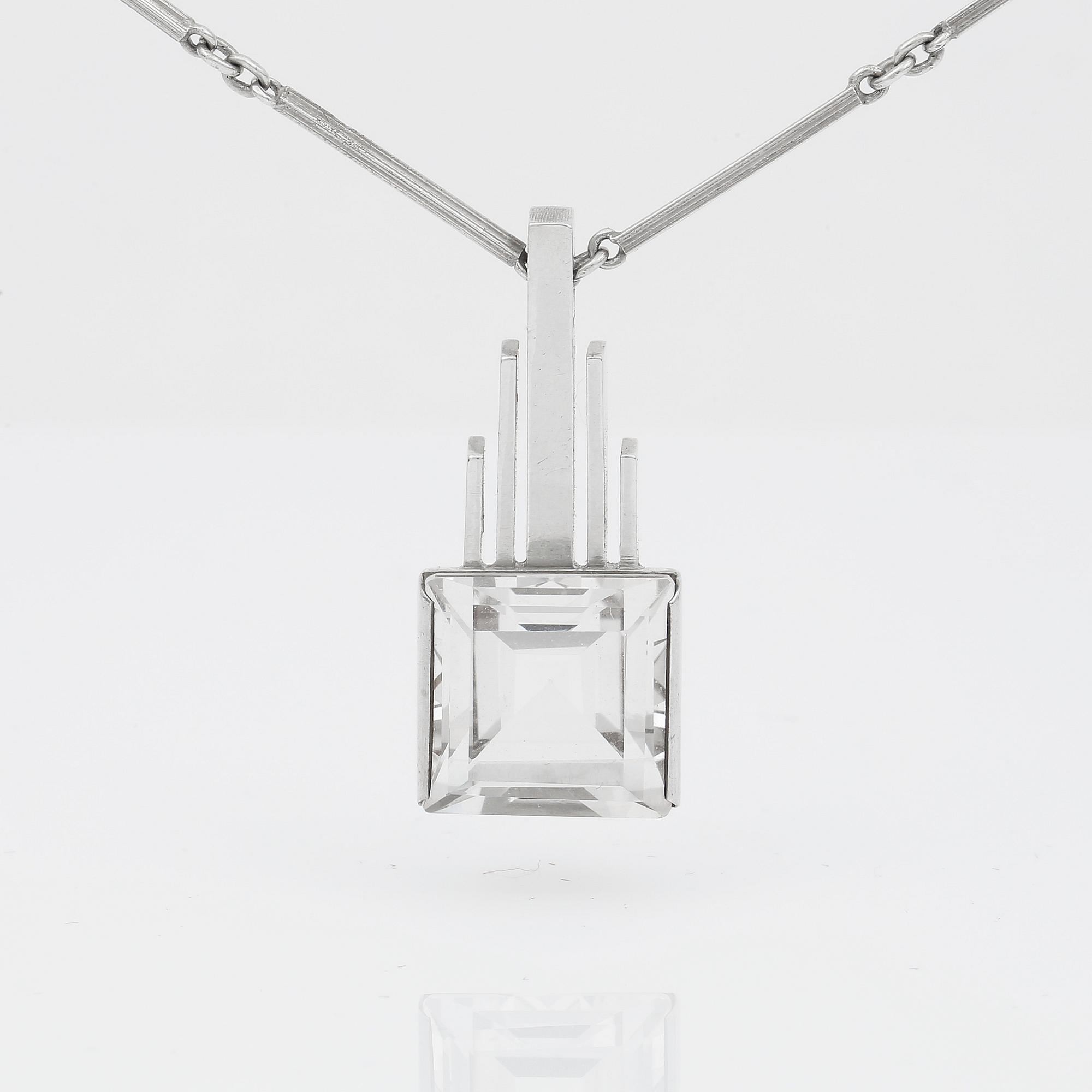 HÄNGE samt KEDJA, silver med bergkristall ca 17,33 ct, Stigbert, Stockholm 1944. Vikt ca 21,46 g.