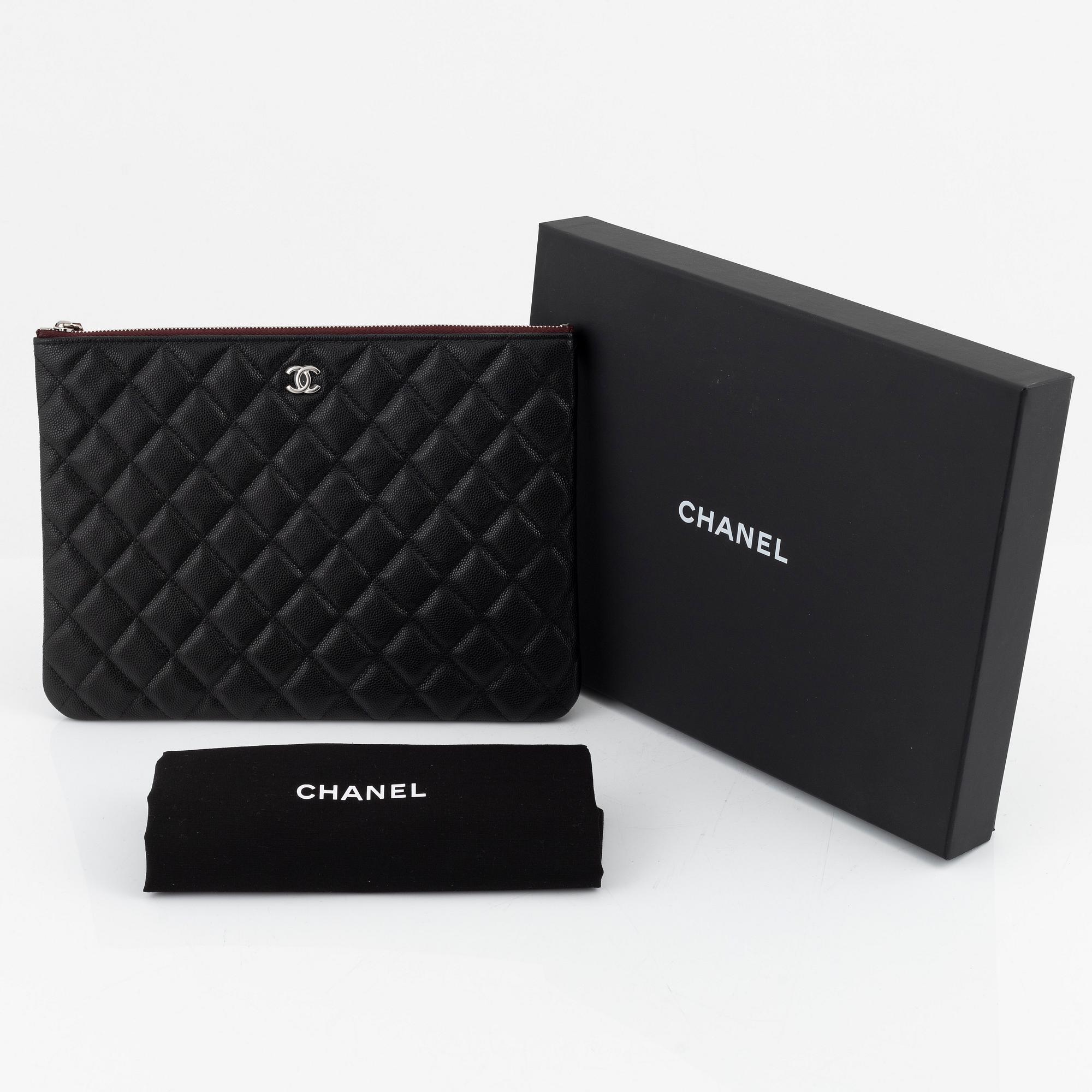 Chanel, a black caviar leather clutch, 2020.