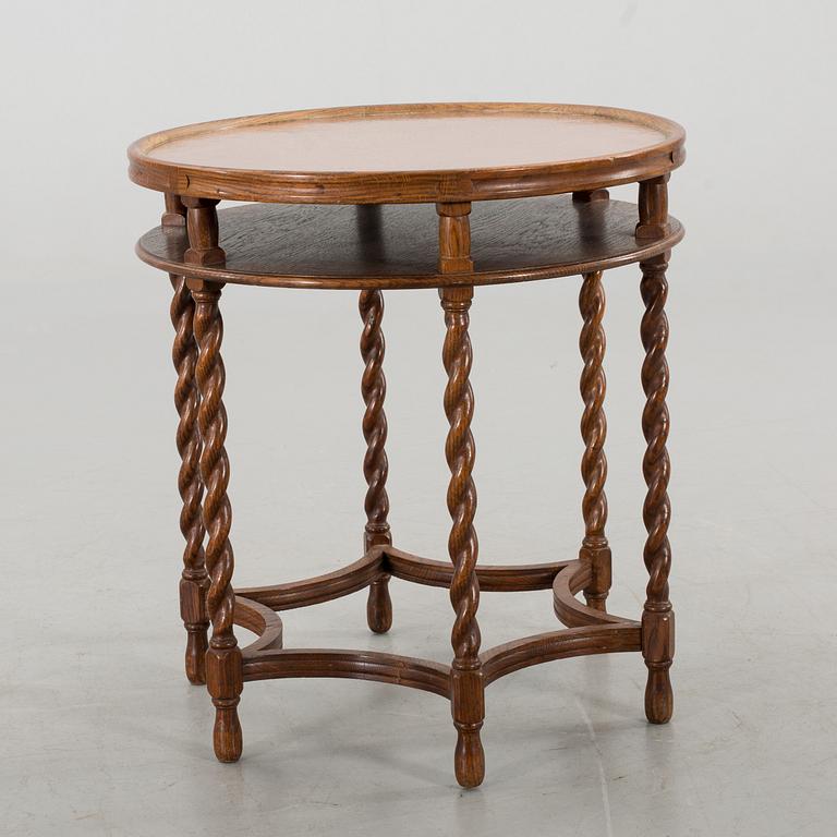 AN OAK TABLE FROM NORDISKA KOMPANIET, 1921.