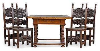A Swiss Baroque table and a set of four chairs.