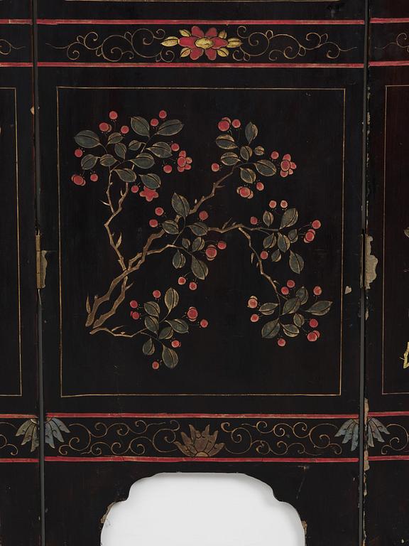 A Chinese four panel lacquer folding screen, first part of the 20th century.