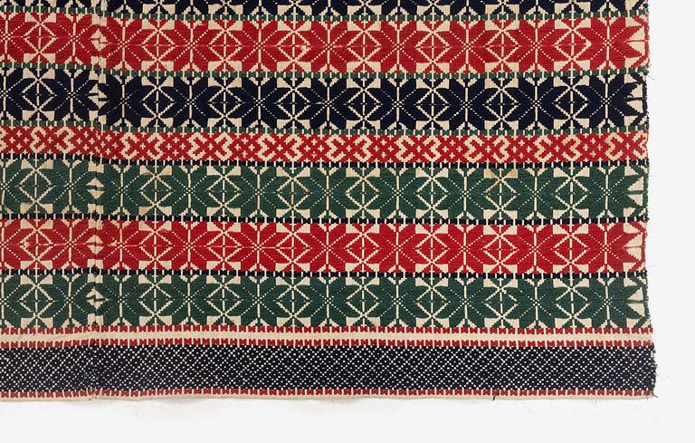 A bed cover in weft-patterned tabby type, c. 180 x 126, Scania, Sweden, first half of the 19th century.