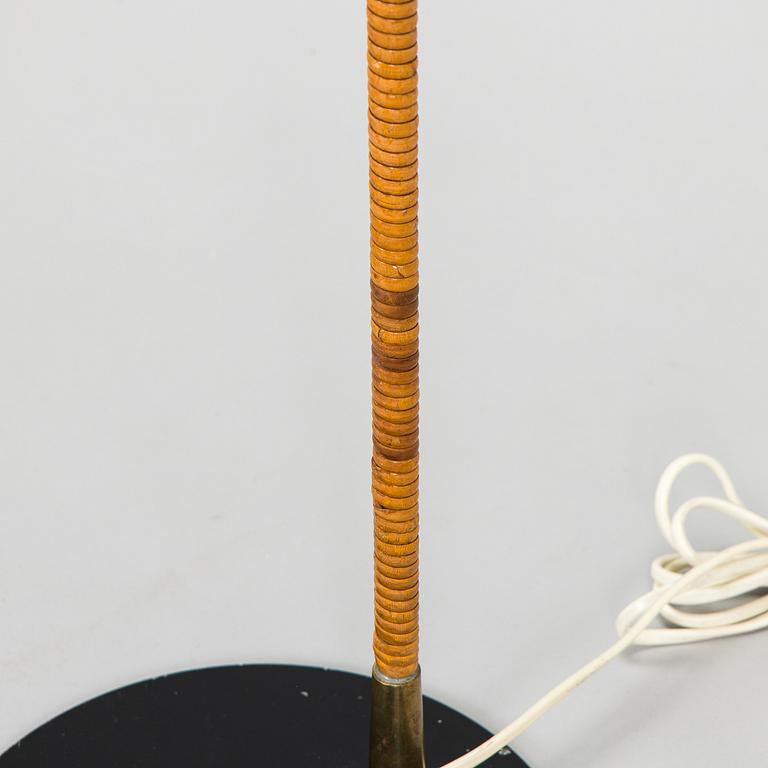 Paavo Tynell, a pair of mid-20th century K10-10 floor lamps for Taito Finland.