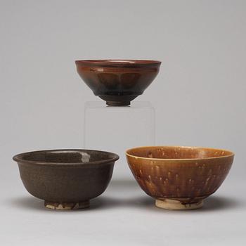 A group of three brown glazed bowls, China, 20th Century.