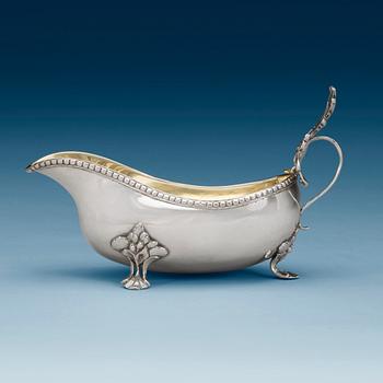 840. A Swedish 18th century parcel-gilt cream-jug, makers mark of Lars Hessling, Linköping 1778.