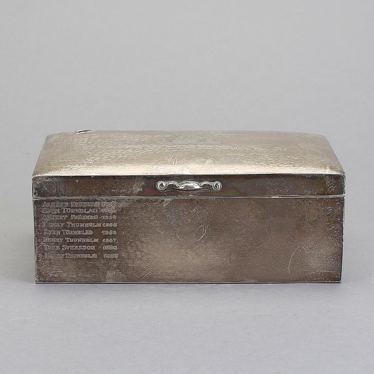 SPELSKRIN. Silver. CG Hallberg, Stockholm 1919.