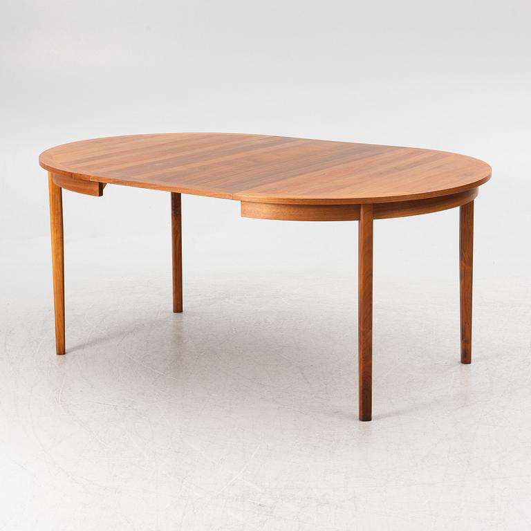 A dining table and four chairs, second half of the 20th century.