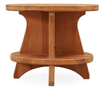 A stained pine table attributed to Axel Einar Hjorth by Nordiska Kompaniet, 1930's.