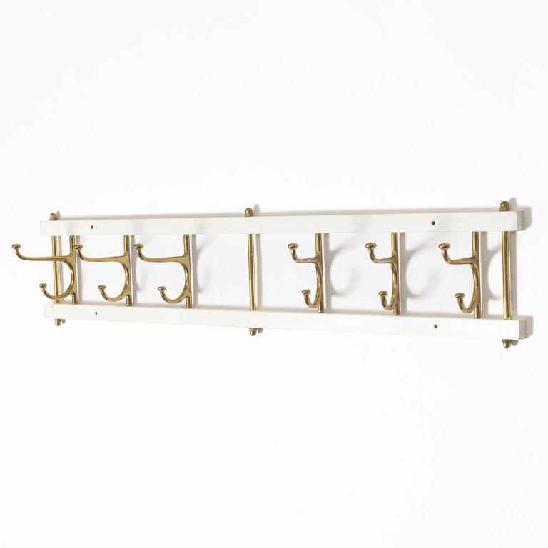 Klädhängare, "Dekorativ", Skoglunds metallgjuteri, Anderstorp, 1950/60-tal.