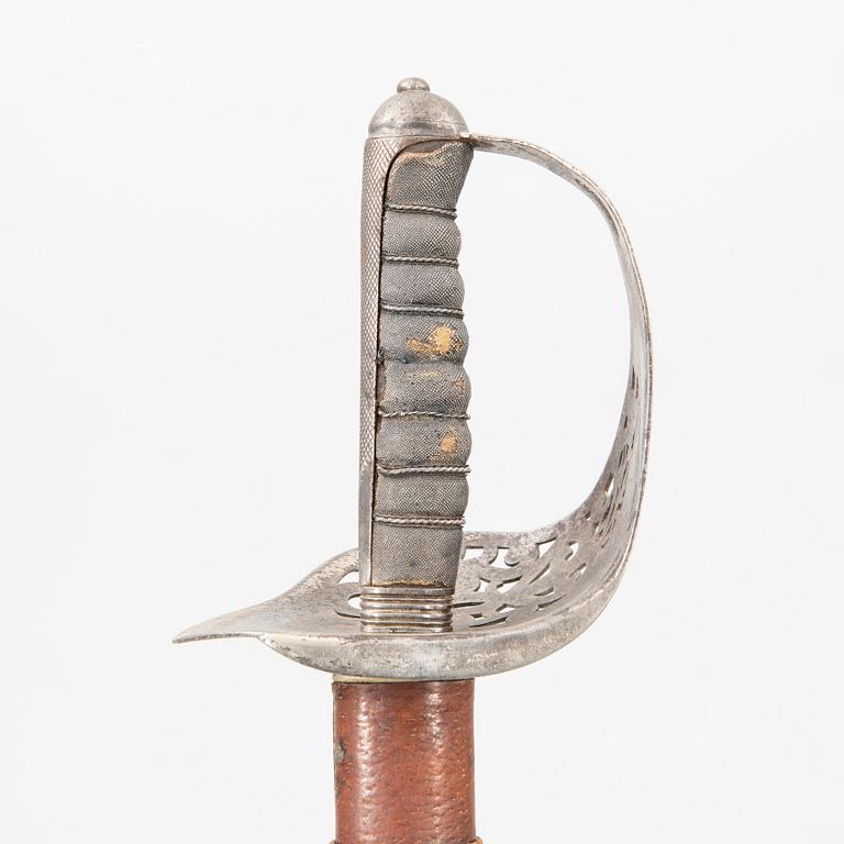 A British sabre 1897 pattern, with scabbard.