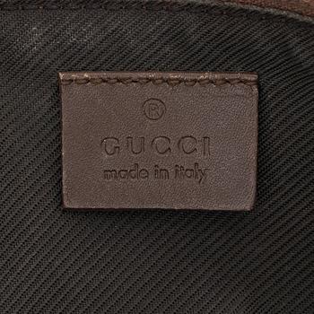 Gucci, a monogram canvas bag.