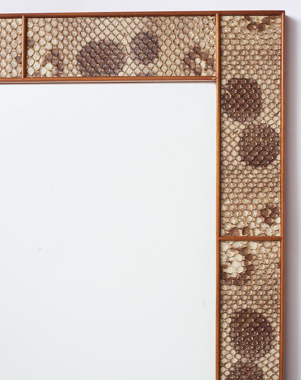 Josef Frank, a snakeskin framed mirror, Firma Svenskt Tenn, Sweden, executed in 1940.