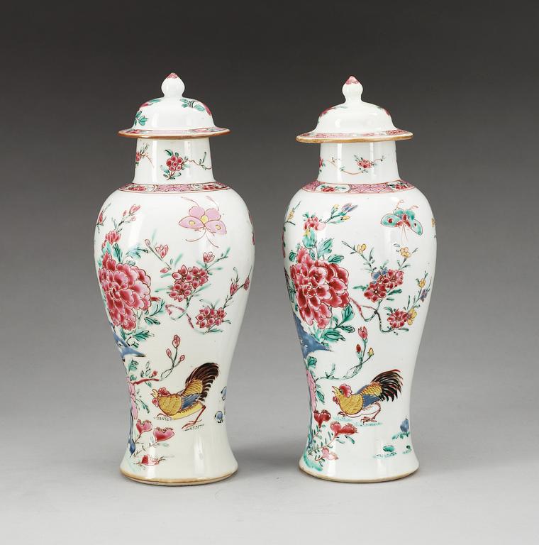 A pair of famille rose 'rooster' vases with covers, Qing dynasty, Qianlong (1736-95).