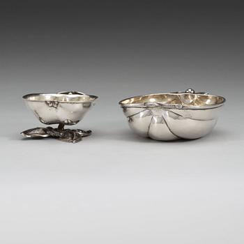 Two Russian mid 19th century parcel-gilt dishes, marked Carl Ekqvist, S:t Petersburg and unidentified maker, Moscow.