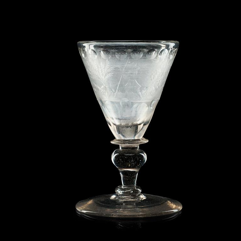 A cut and engraved goblet, 18th Century.