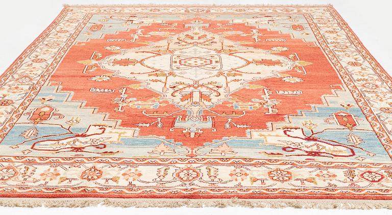 A Heriz design carpet 393 x 293 cm.