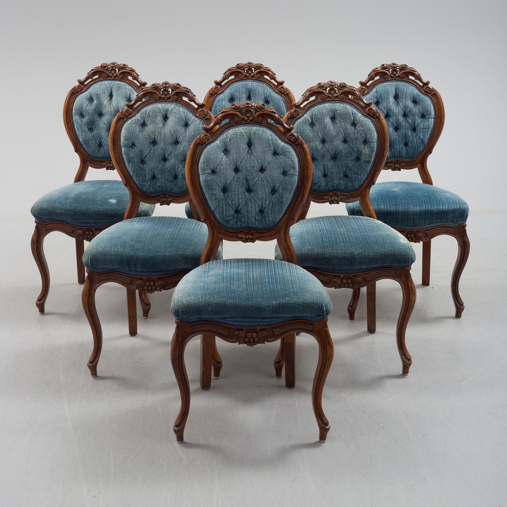 Six late 19th century walnut chairs.