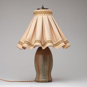 A Patrick Nordström stoneware table lamp with patinated brass mounts, Royal Copenhagen, Denmark 1919.