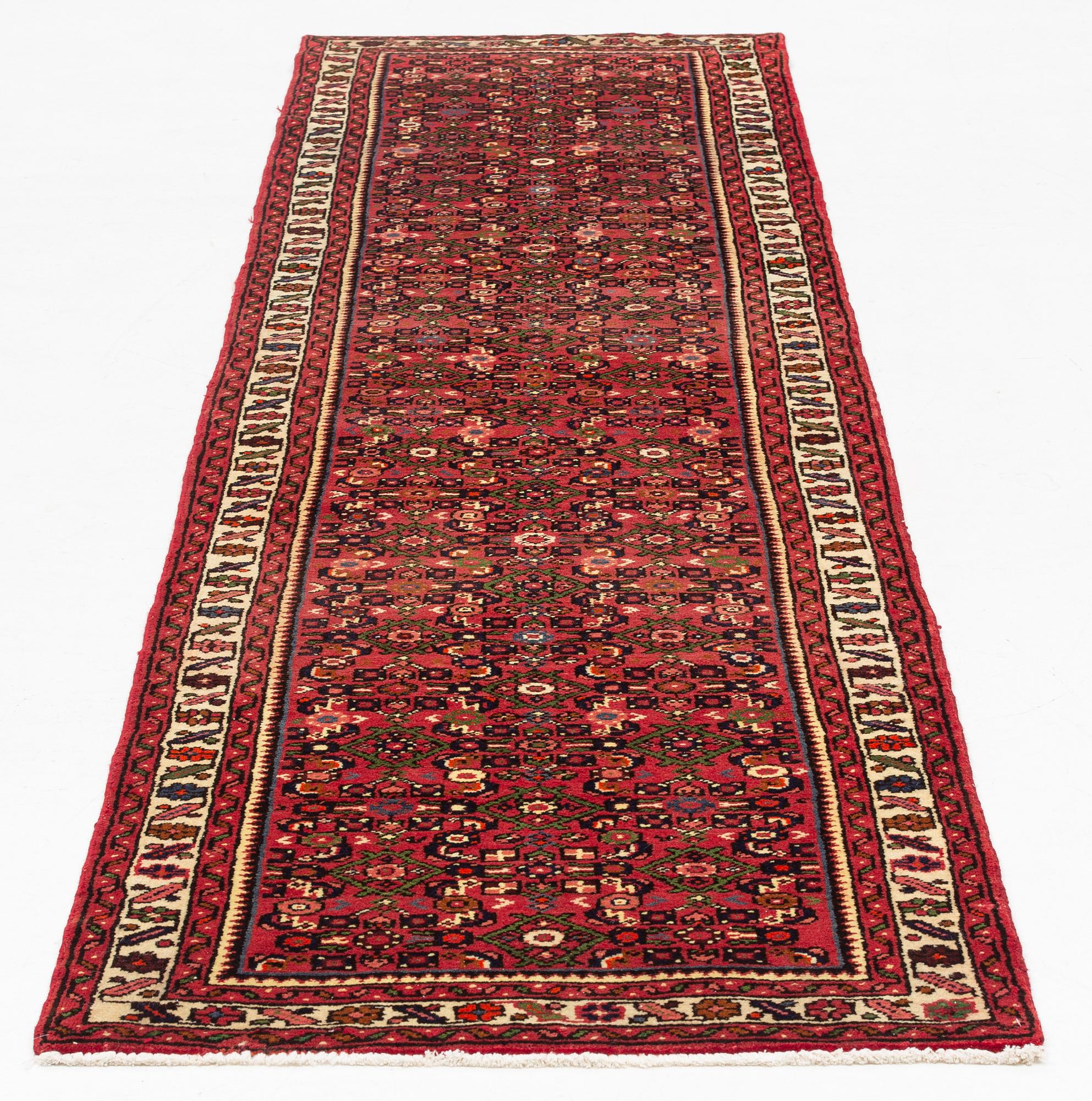 A Hosenabad runner, approximately 322 x 81 cm.