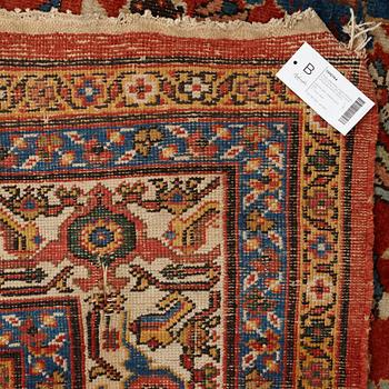 A carpet, an antique Mahal, Ziegler pattern, ca 371,5-374,5 x 265-266 cm (as well as a little flat weave at one end).