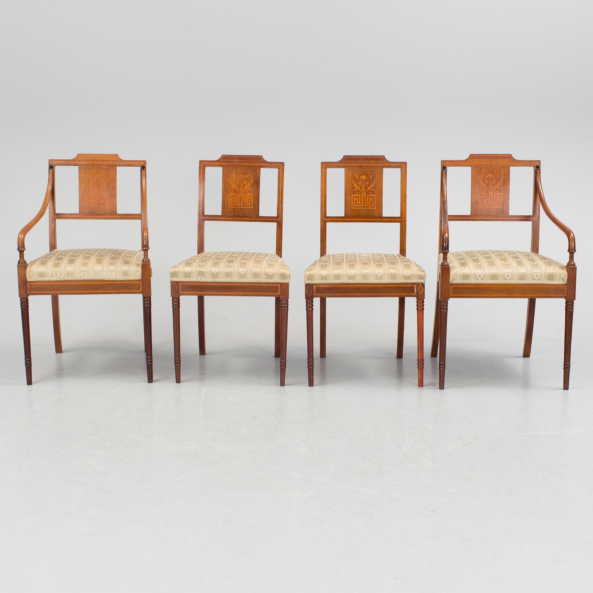 A 1920/30s Swedish Grace sofa, a pair of chairs, a pair of armchairs and a table veneered with mahogany.