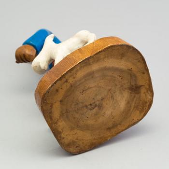 a Tintin and snowy wood scuplture from the second half of the 20th century.