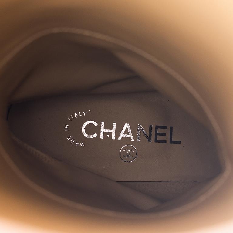 Chanel, a pair of sequin high boots, size 37.